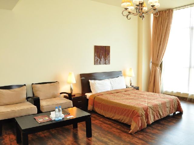 فخامة الغرف القياسية في فندق المنزل بالبحرين الشهير في المنامة
