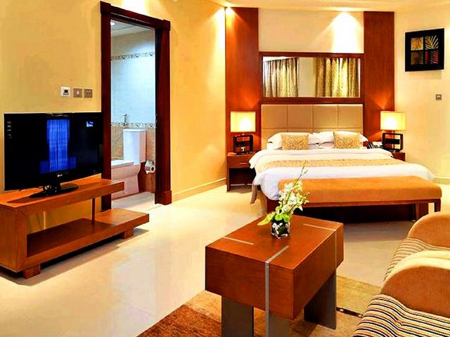 تتضمن مرافق الغُرف في فندق بيرل بارك دبي تلفاز وأريكة.