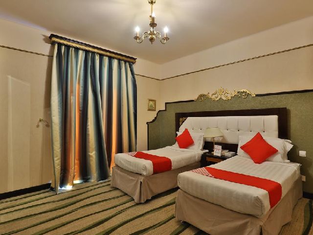 غرفة قياسية لفندق منازل العين جراند من أجمل  فنادق رخيصه في مكه العزيزيه